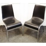 A pair of mid 20th century chrome and leather chairs.