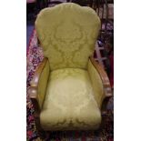 A 1920/30's club chair, shaped padded back, arms and seat, cabriole forelegs.
