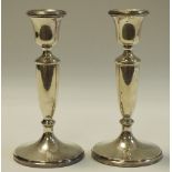 A pair of silver candlesticks, lion passant mark, 1959, 9.