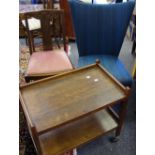 An Edwardian mahogany bedroom chair; a 1930's nursing chair; an oak sewing box; an oak tea trolley.