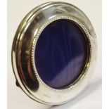 An Elizabeth II silver circular easel photograph frame,