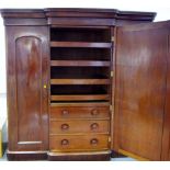 A Victorian mahogany triple compactum wardrobe, ogee cornice,