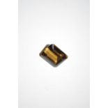 A 23ct emerald cut loose smokey topaz