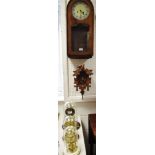 A 1940's Bentima oak cased wallclock; a modern Black Forest style cuckoo clock;