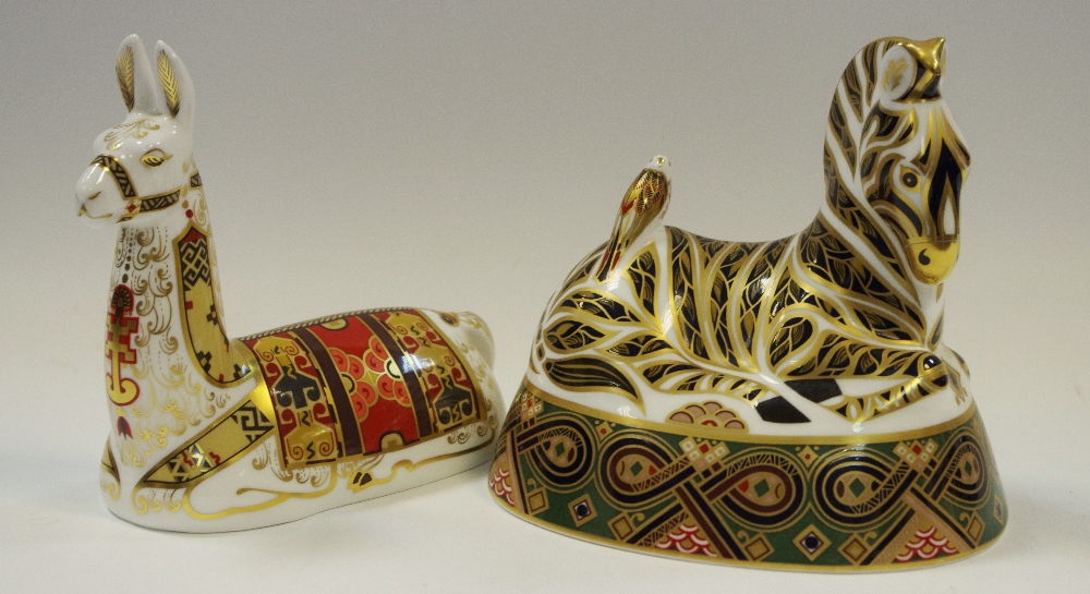 A Royal Crown Derby paperweight Collectors Guild Llama, gold stopper, 1st quality, boxed; another,