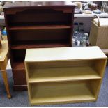 An oak floor standing bookcase; another, modern, shelving over fall front cupboard.