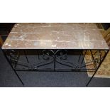 A wrought iron side table, rouge marble top, 79cm high x 101cm long x 46.