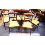 A set of six Regency mahogany dining chairs, curved top rail,