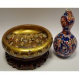 A Satauma bowl decorated with elders, wooden stand; a double gourd vase.