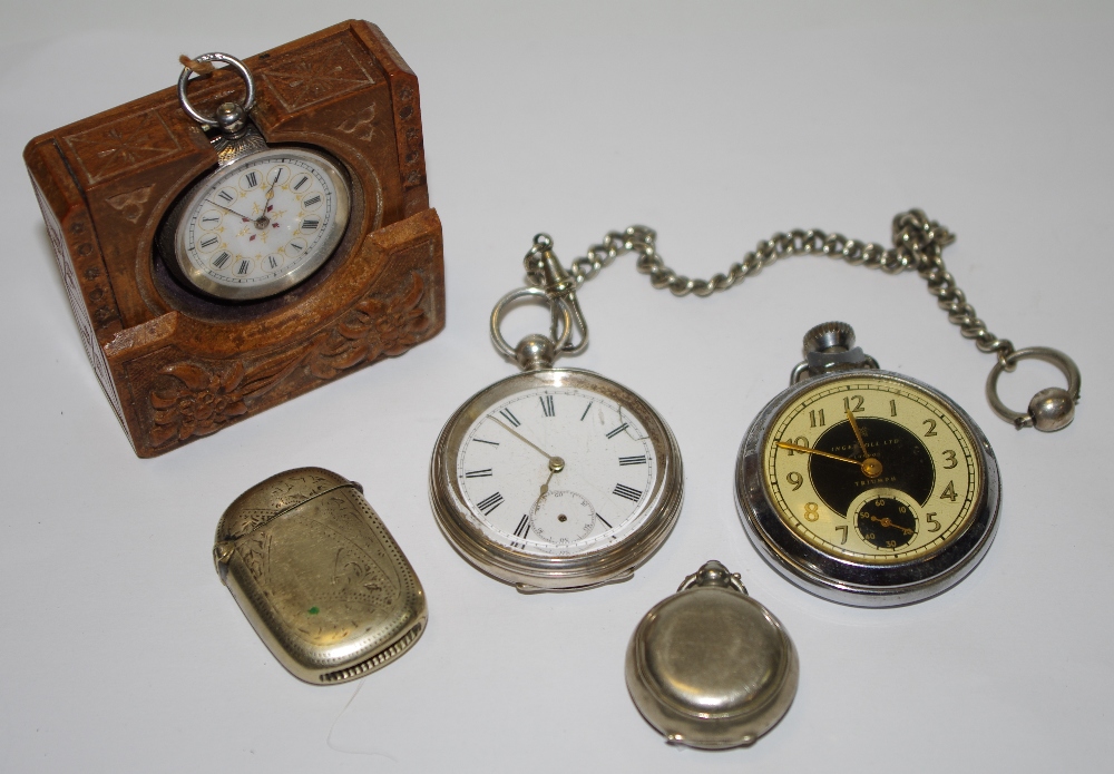 A silver open face pocket watch and chain; a continental fob watch; vesta c.