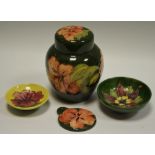 A Moorcroft Hibiscus ginger jar & cover, green ground 16cms high; others,