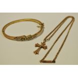 A gold coloured bangle with turquoise and seed pearl (5g); a 9ct crucifix with seed pearl (1g),