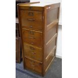 An oak four drawer filing cabinet circa 1930.