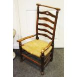 An unusual rush seated oak nursing chair.