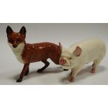 A Beswick model of a pig and a fox (2)
