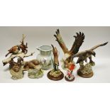 Decorative ceramics - Country Artists Swimming Otter; other otters;a swooping eagle;