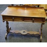 A Victorian mahogany serving table, shaped gallery, two short drawers,