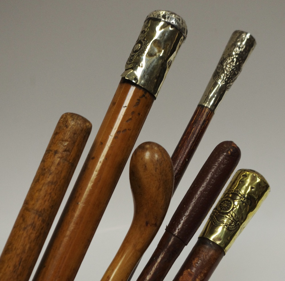 A Royal Artillery officer's riding crop; a silver mounted swagger stick;