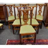A set of six Victorian mahogany dining chairs, shaped top rail, pierced vasular splat, drop in seat.