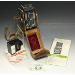 A Yashica-44 camera with accessories