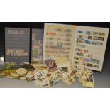 Stamps and Cigarette Cards - a large stock book of thematic stamps,