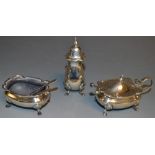 A silver three piece cruet set,