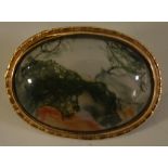 An opal old mounted moss agate brooch