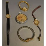 A 9ct gold lady's Summit wristwatch on leather strap; another on expanding strap;