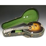 A 20th century Radiotone mandolin,
