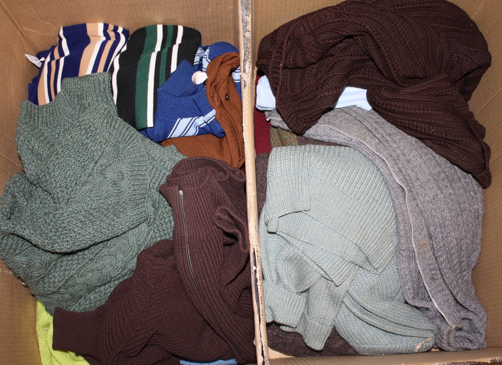 A large quantity of vintage knitwear, mainly mid 20th century, men's and women's jumpers, cardigans,