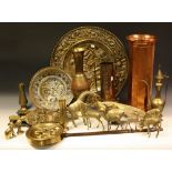 Copper and Brassware - an embossed brass tray; Persian style vase; model bird;