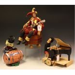 A wooden automaton, piano player; a clockwork automaton Jester, with a lute,