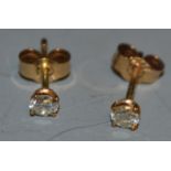 A pair of diamond ear studs