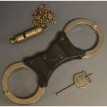 Boxes and Objects - a pair of Miatts Police issue handcuffs, with key; a J Hudson & Co,