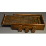 A set of brass dominoes,
