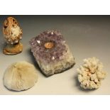 A large amethyst geode cluster,