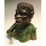 A Cast Iron Dinah money box,