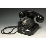 An early 20th century Bakelite telephone