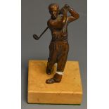 An early 20th century brown patinated bronze cabinet model, of a golfer taking a swing,