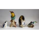 A Royal Crown Derby paperweight, Penguin and Chick, gold stopper; another, Baby Bottlenose Dolphin,