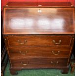 An Edwardian crossbanded mahogany bureau, fall front enclosing an arrangement of small drawers,