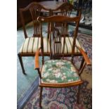 An early 20th century elbow chair;