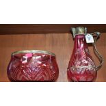 A Victorian 'Cranberry' glass claret jug;