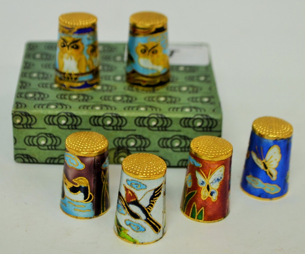 A set of six cloisonne thimbles ***PLEASE NOTE THERE IS NO BUYER'S PREMIUM ON THIS LOT,