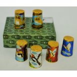 A set of six cloisonne thimbles ***PLEASE NOTE THERE IS NO BUYER'S PREMIUM ON THIS LOT,