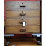 A mid-20th century chest, of small proportions,