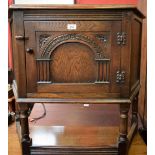 An oak credence type cupboard, 83.