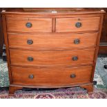 An early 20th century mahogany bow front chest of two short over three long graduated cockbeaded