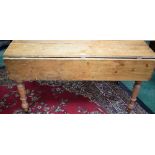 A Country kitchen pine table, rectangular top with fall leaves above a single frieze drawer,