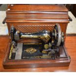 An early 20th century Singer hand crank sewing machine, R772570,